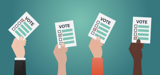 mains et cartons de vote illustrant des élections